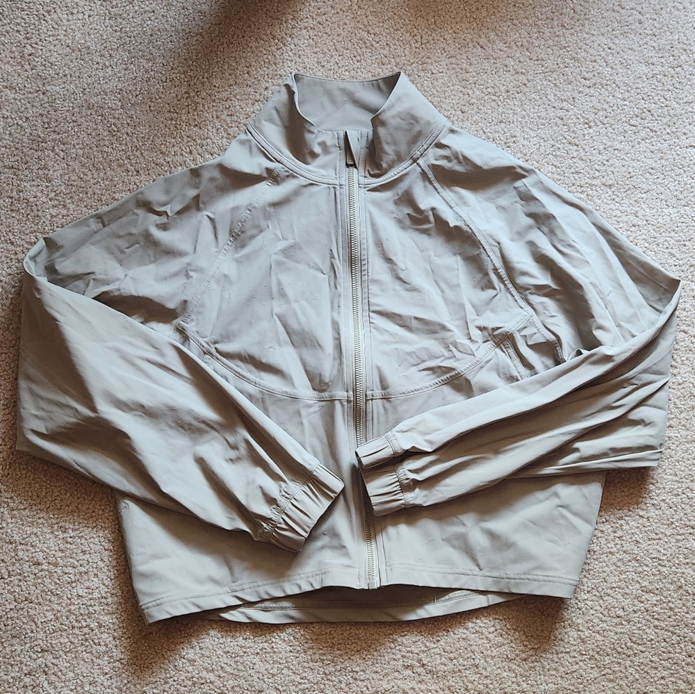 AOMPMSDX khaki upf jacket. nwot